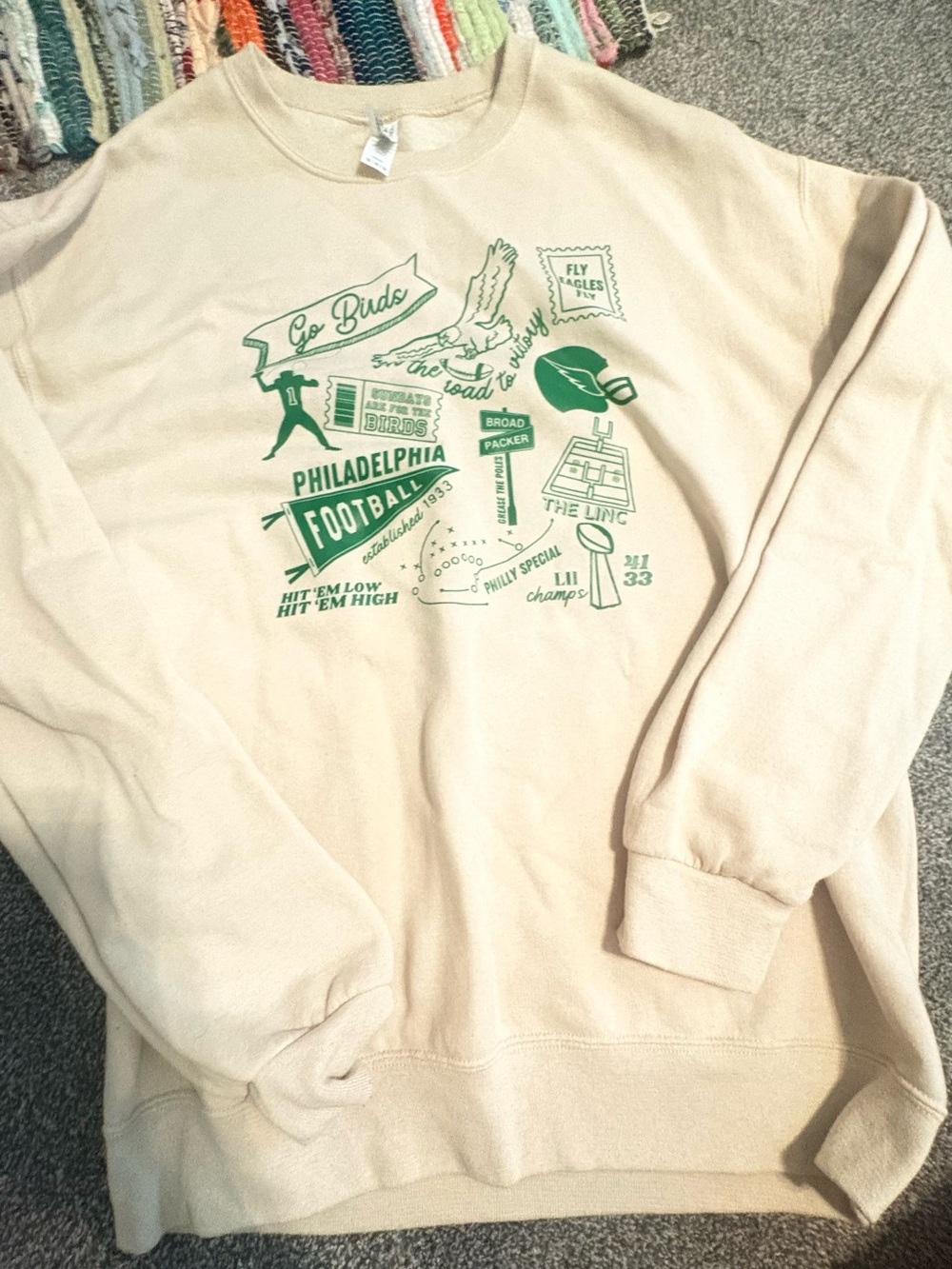 Hanes Cream Crewneck Sweatshirt with Green Philadelphia Football Graphic